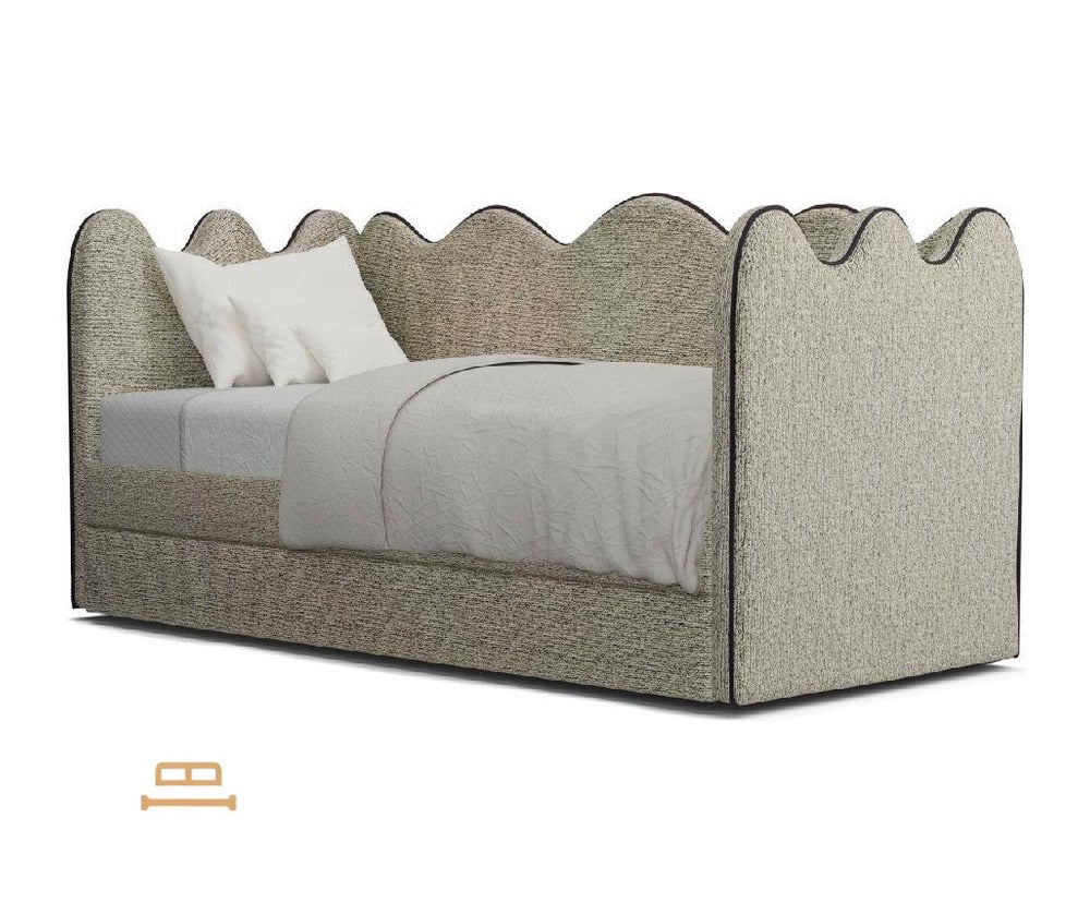 Adelina daybed with scalloped backrest, angled view